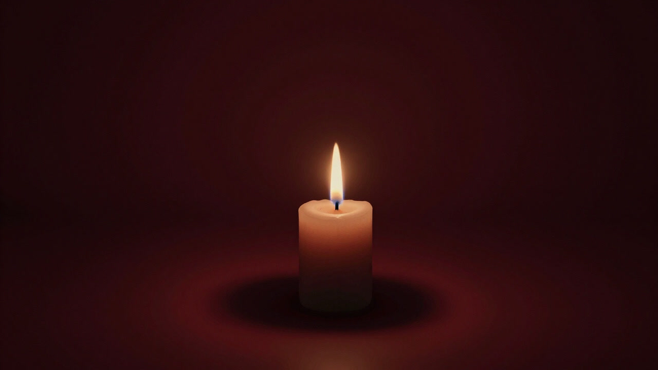暗闇に浮かぶ一つのろうそくが、周囲の影を嘲笑うように揺らめく