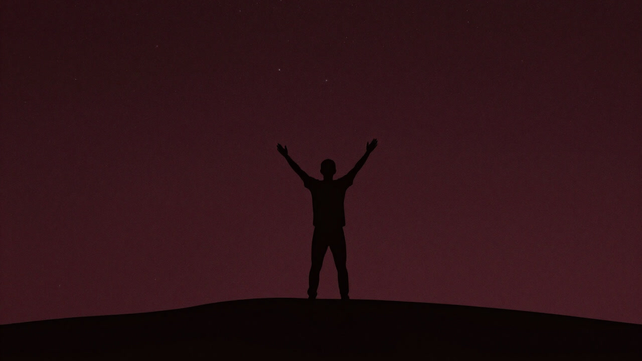 Silhouette raising hands to the sky emerging from darkness