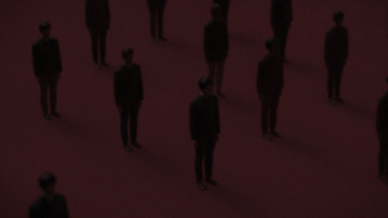 Silhouette of a programmer staring at infinite mirrors reflecting themselves