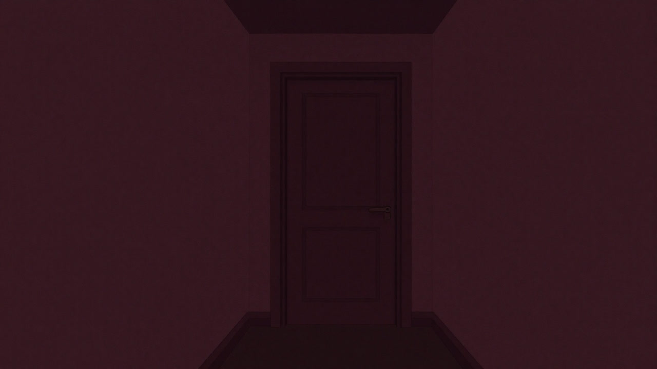 古いアパートの廊下に佇む空室の玄関ドア