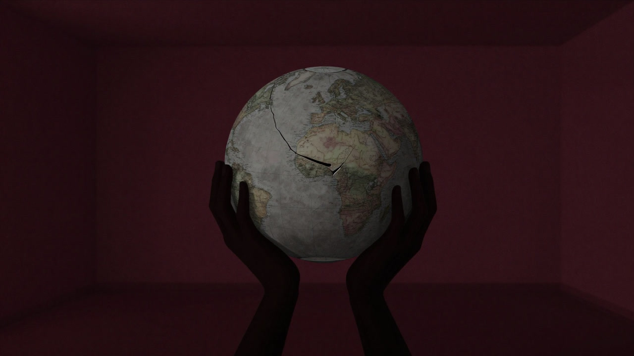 Silhouette of hands holding a cracked globe